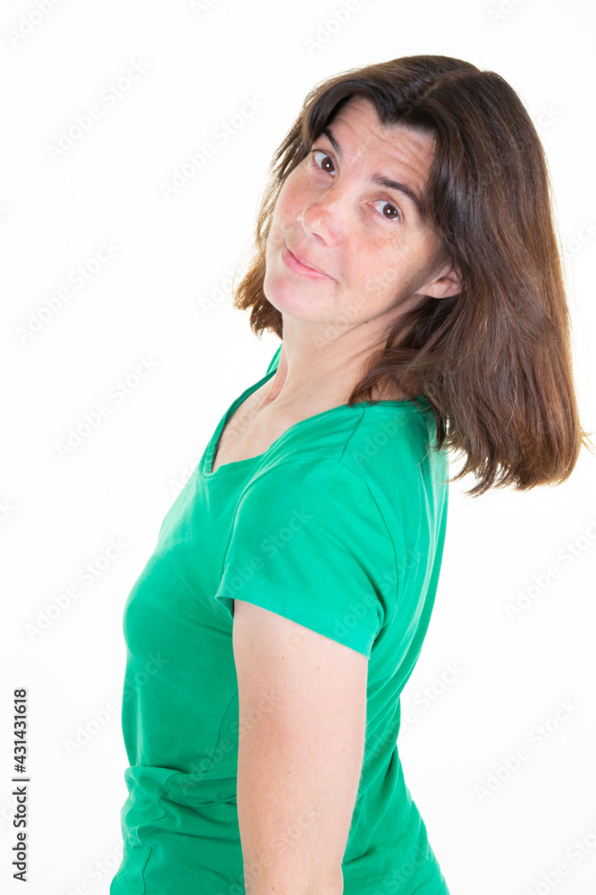pretty middle aged woman smile positively at camera poses against white background pretty middle aged woman smile positively at camera poses against white background