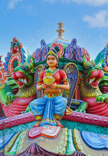 Beaituful Angel statue on hindu temple tower 