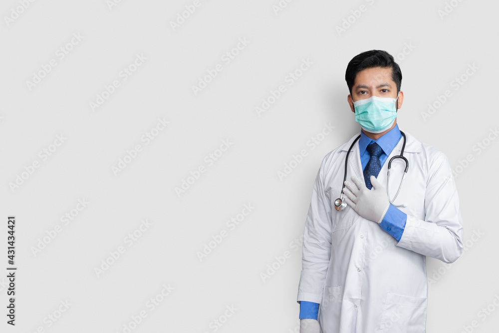 comfort sign showed by a male doctor, isolated on white copy space comfort sign showed by a male doctor, isolated on white copy space