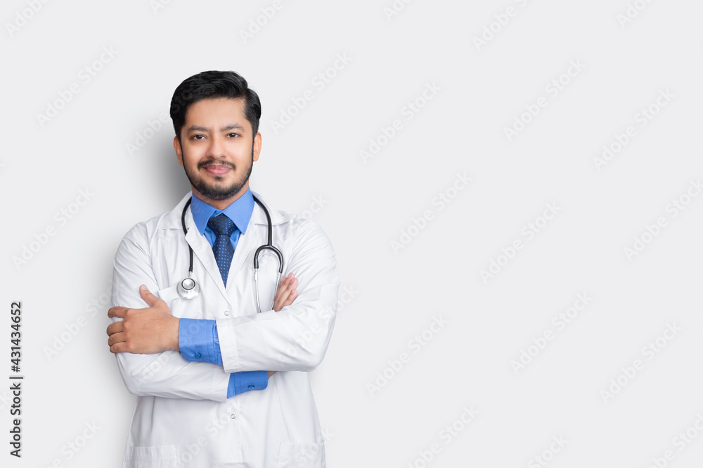 Portrait of male doctor with stethoscope & arm cross isolated on white background. Health insurance concept. Portrait of male doctor with stethoscope & arm cross isolated on white background. Health insurance concept.