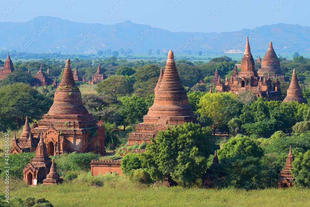 Sunny landscape with ancient Buddhist temples of Bagan. Burma Sunny landscape with ancient Buddhist temples of Bagan. Burma
