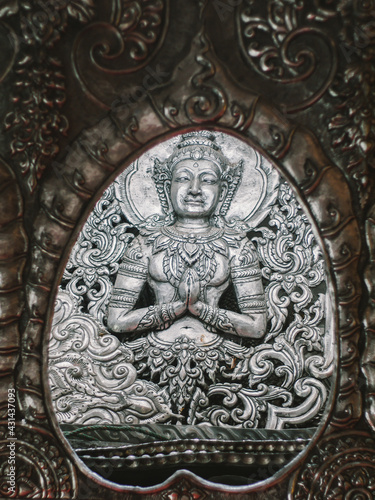 Thai style wall sculpture with space on background 
