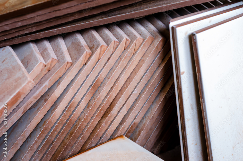 Stacked rectangular scraps of ceramic tiles Stacked rectangular scraps of ceramic tiles
