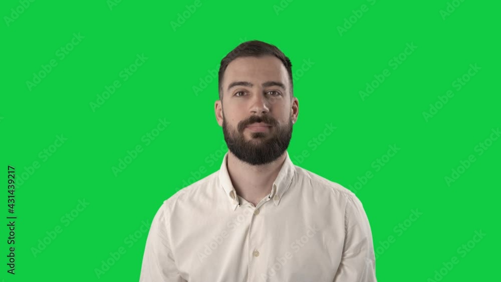Uncertain apathetic young business man with apologizing look. Portrait on green screen background. Uncertain apathetic young business man with apologizing look. Portrait on green screen background.