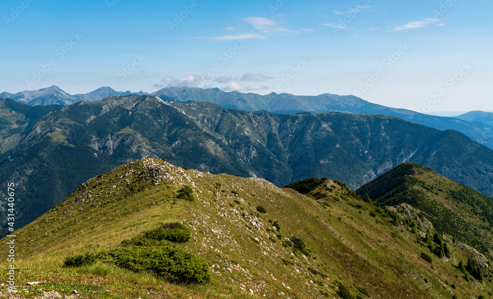 Retezat mountai range from Coada Oslei hill summit in Valcan mountains in Romania