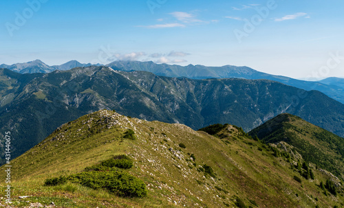 Retezat mountai range from Coada Oslei hill summit in Valcan mountains in Romania