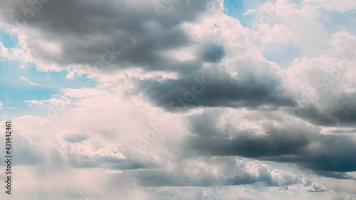 Cloudy Sky With Fluffy Rain Clouds. Natural Background © Grigory Bruev