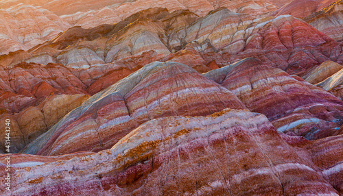 Close-up at sunrise of the Colorful eroded badlands in the Zhangye Danxia National Geopark, Gansu Province, China
