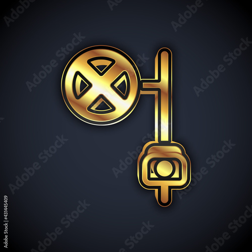 Gold Stop sign with camera icon isolated on black background. Traffic regulatory warning stop symbol. Vector
