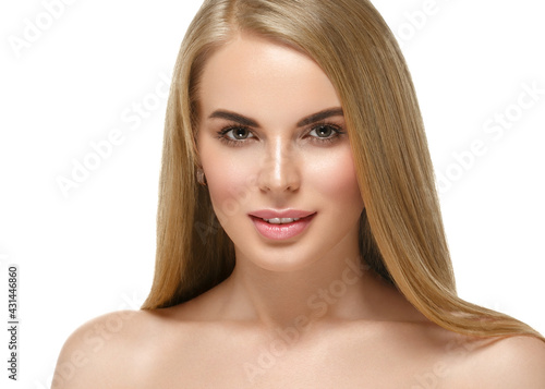 Beautiful young woman with healthy clean skin natural make up healthy blonde hair beautiful eyes and lips