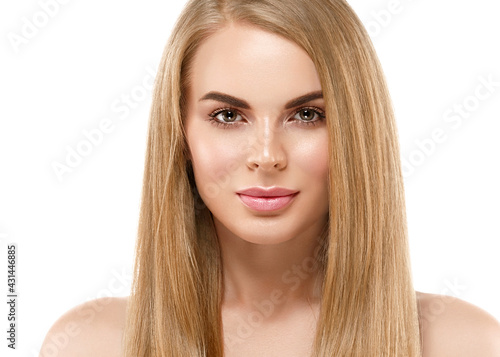 Beautiful young woman with healthy clean skin natural make up healthy blonde hair beautiful eyes and lips