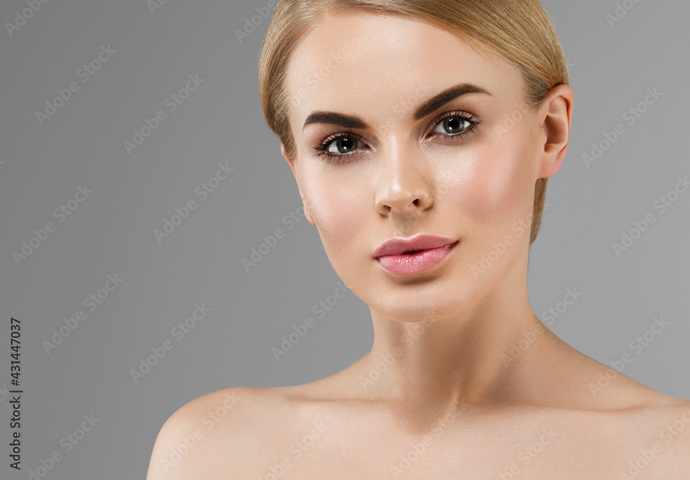 Beautiful young woman with healthy clean skin natural make up healthy blonde hair beautiful eyes and lips Beautiful young woman with healthy clean skin natural make up healthy blonde hair beautiful eyes and lips