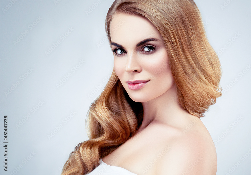 Beautiful blonde hair woman with healthy hair and skin over gray background, beauty young model with cute face and lips eyes beauty Beautiful blonde hair woman with healthy hair and skin over gray background, beauty young model with cute face and lips eyes beauty