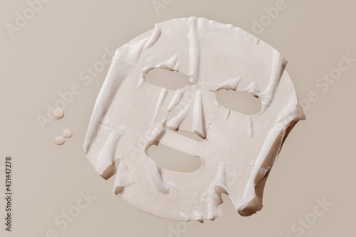 facial sheet mask on brown background.  photo