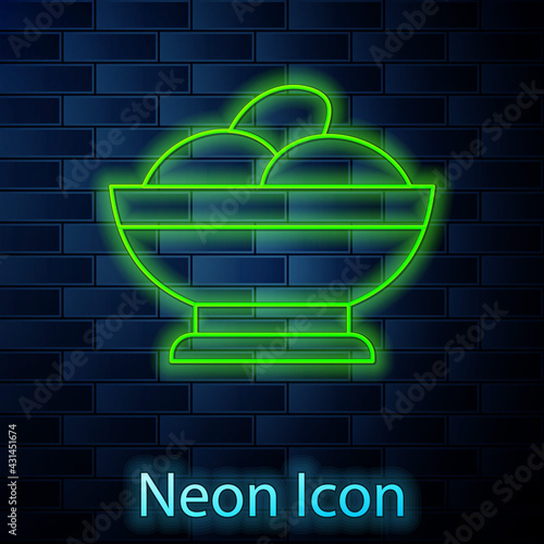 Glowing neon line Varenyky in a bowl icon isolated on brick wall background. Pierogi, varenyky, dumpling, pelmeni, ravioli. Traditional Ukrainian food. Vector