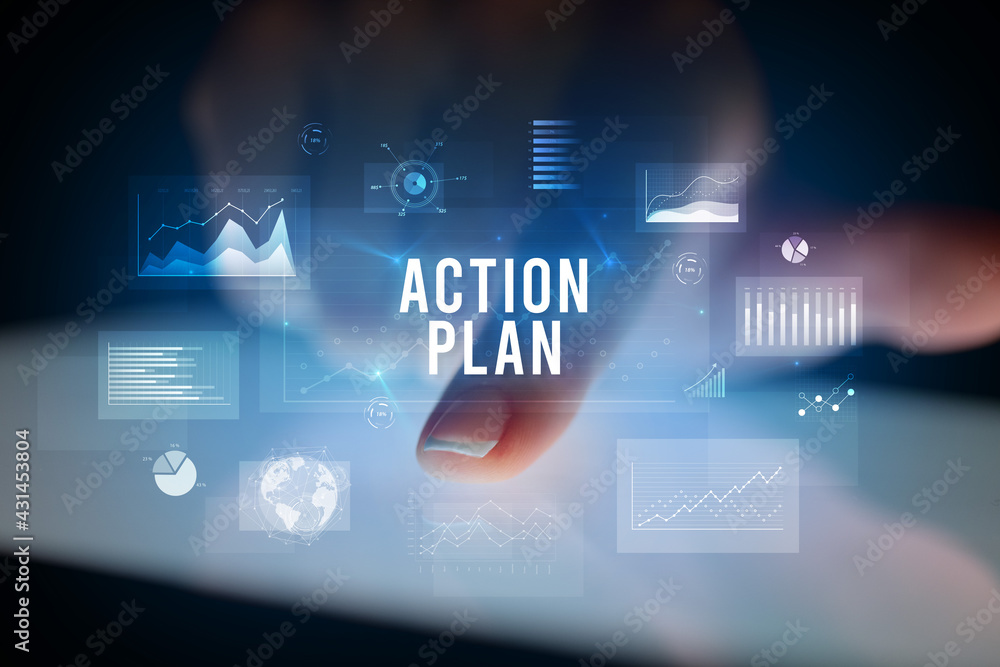 Finger touching tablet with business graphs and icons concept Finger touching tablet with business graphs and icons concept