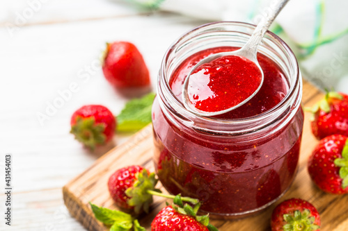 Strawberry jam in the glass jar