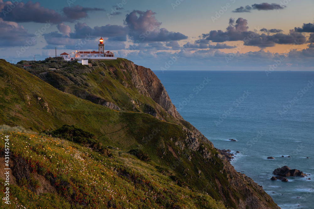 Lighthouse at Cape Cabo da Roca near the city of Cascais, Portugal. Cape Roca is the most western point of continental Europe. 