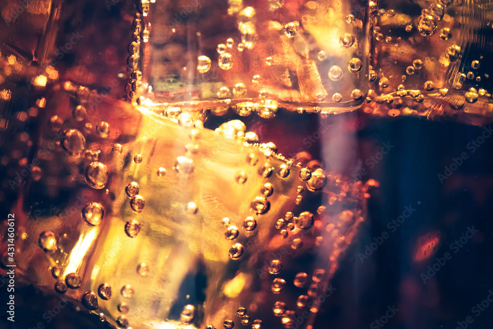 Refreshing Bubbly Soda Pop with Ice Cubes. Cold soda iced drink in a glasses - Selective focus, shallow DOF Refreshing Bubbly Soda Pop with Ice Cubes. Cold soda iced drink in a glasses - Selective focus, shallow DOF