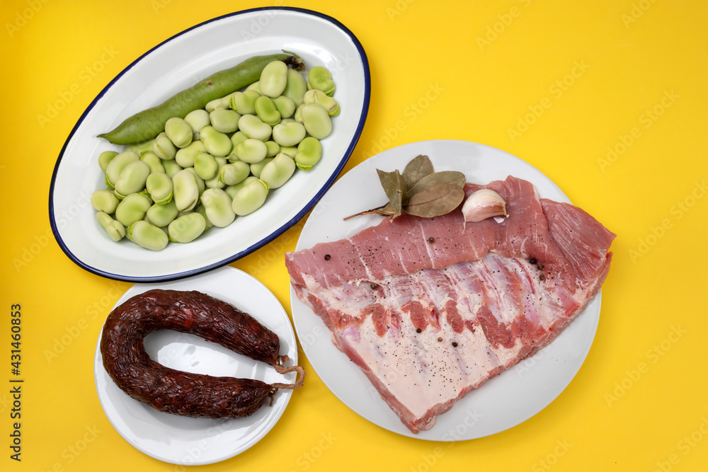 ingredients for portuguese dish green beans, smoked sausage and meat ingredients for portuguese dish green beans, smoked sausage and meat