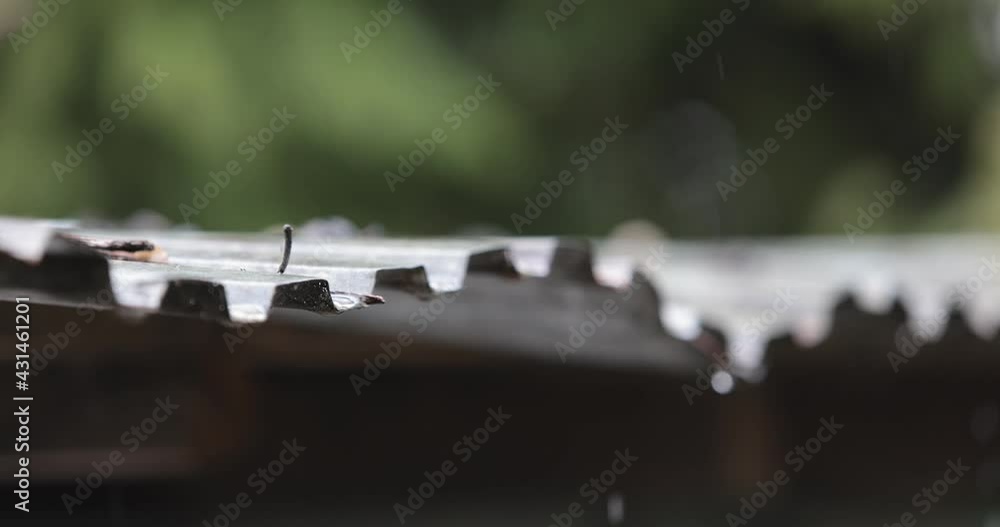 Raindrops Falling From The Roof Of A House In Slow Motion Raindrops Falling From The Roof Of A House In Slow Motion