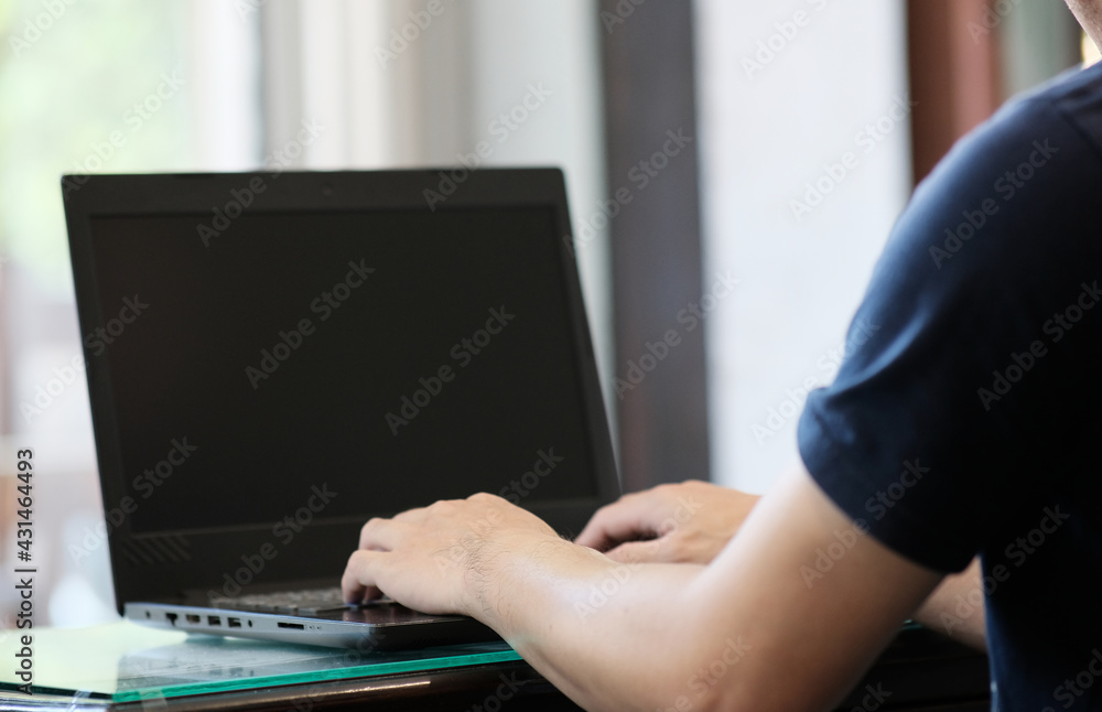 Fototapeta premium person working on laptop