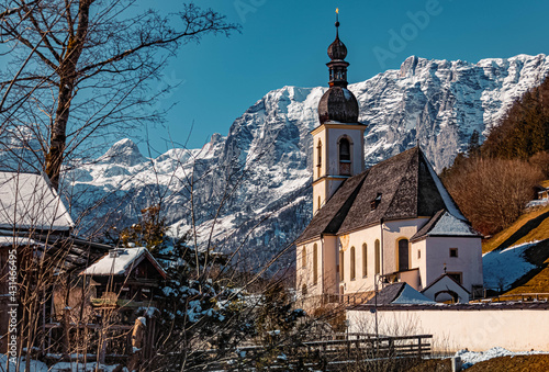 Beautiful winter landscape with the famous church Saint Sebastian and the Reiteralpe summit in the background at Ramsau, Berchtesgaden, Bavaria, Germany
