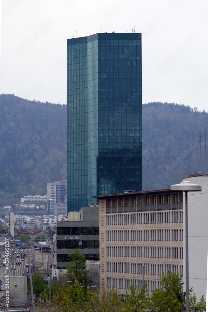 City of Zurich cityscape with skyscraper Prime Tower with local mountain Uetliberg in the background. Photo taken April 29th, 2021, Zurich, Switzerland.
