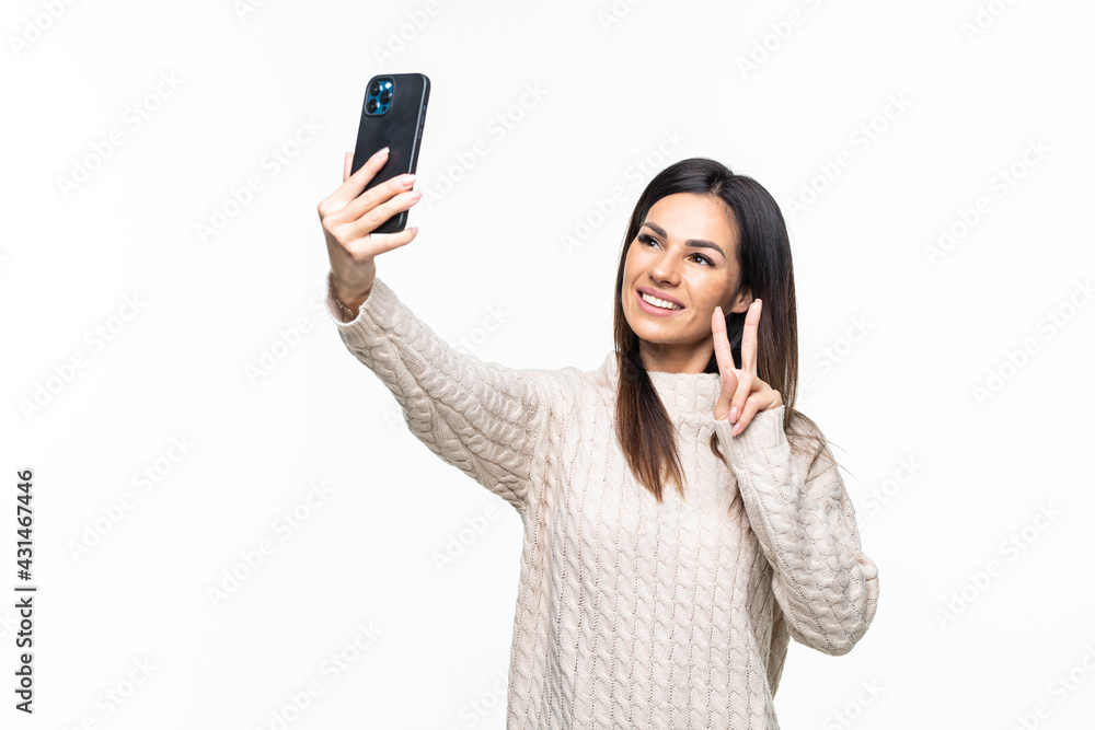 Happy woman chatting via video call and greeting with hand isolated on a white background Happy woman chatting via video call and greeting with hand isolated on a white background