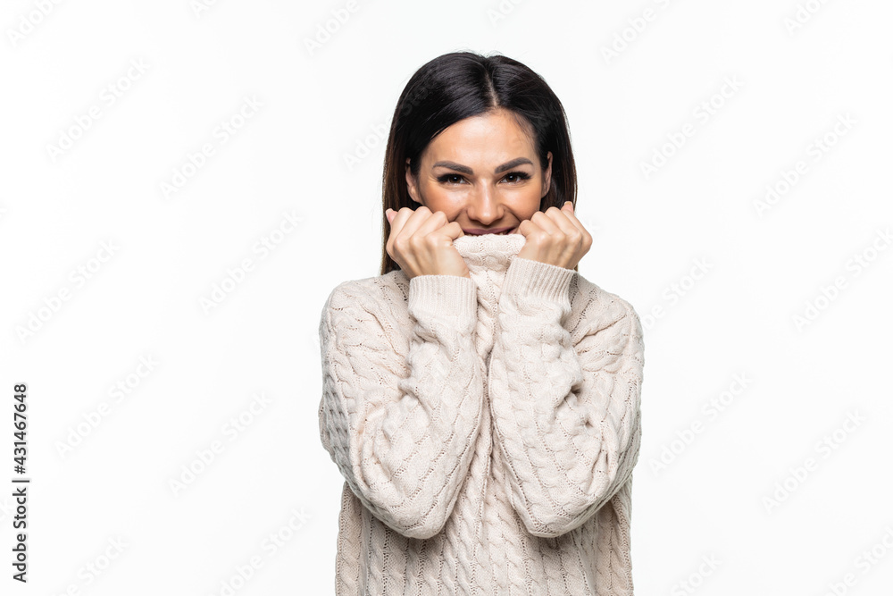 beautiful happy young woman wearing a high neck sweater, against white background beautiful happy young woman wearing a high neck sweater, against white background