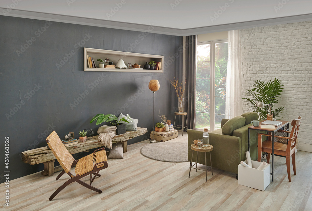 Fototapeta premium Grey stone wall in the living room, green armchair, wicker chair, orange lamp and working table, laptop and niche. Modern interior style.