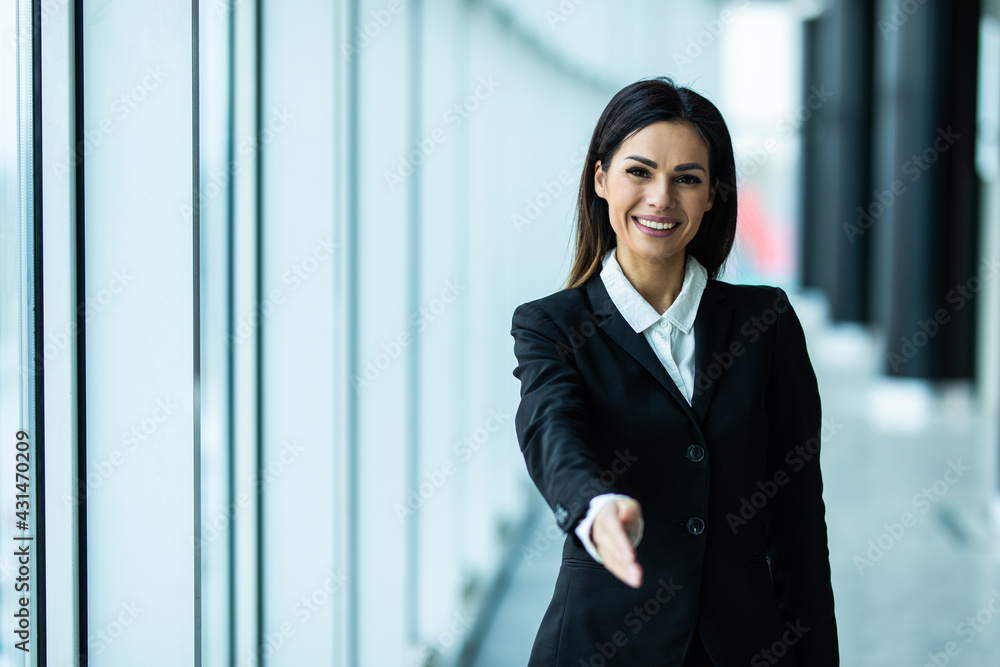 Businesswoman offer hand to shake as hello in office closeup. Invite to participate concept