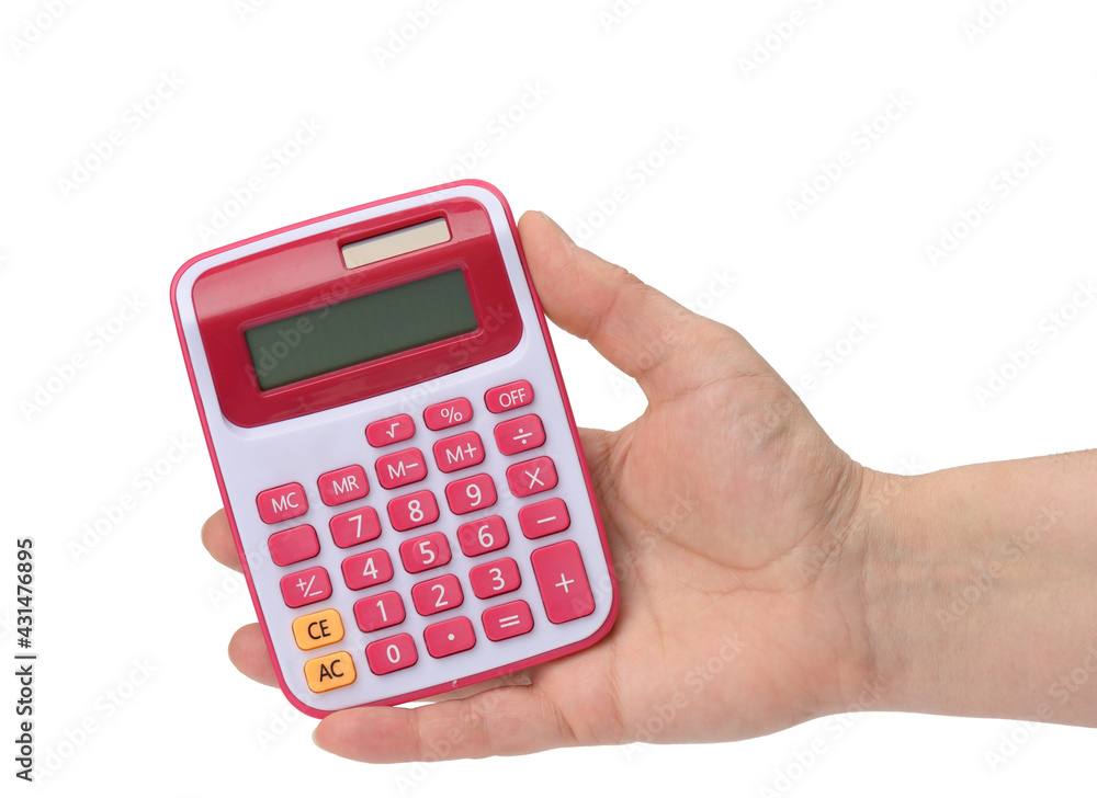 female hand holding a pink calculator on a white background female hand holding a pink calculator on a white background