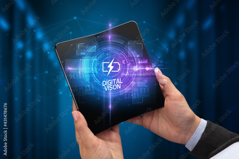 Businessman holding a foldable smartphone, technology concept Businessman holding a foldable smartphone, technology concept