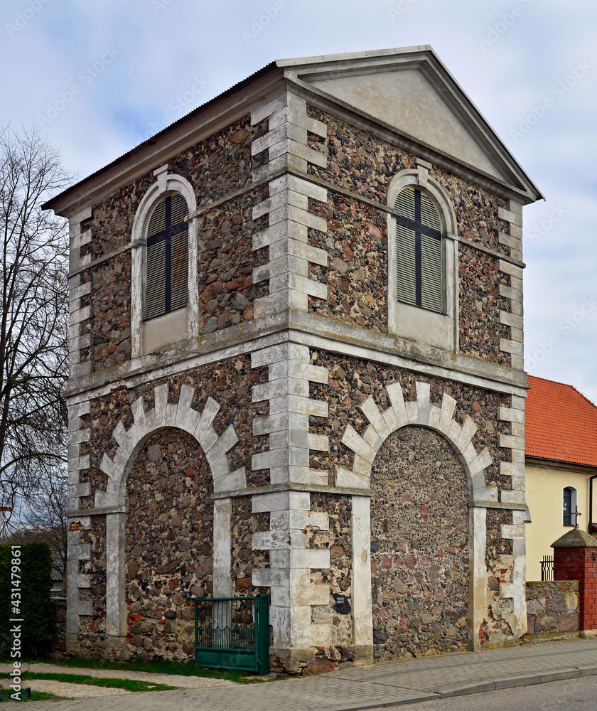 Close-up photos of the architectural details and the belfry of the Catholic Church of Saint Lawrence built at the beginning of the 19th century in Dolistowo in Podlasie, Poland.