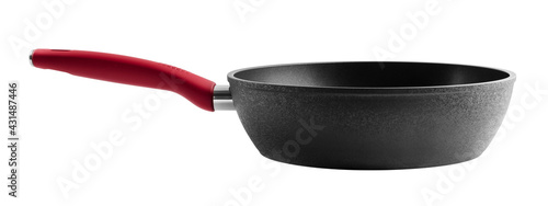 Black frying pan with a red handle on a white background, side view. Isolated object
