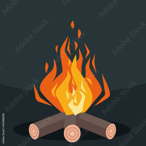 Bonfire on a dark background. Fire sparks. Leisure at the camp.