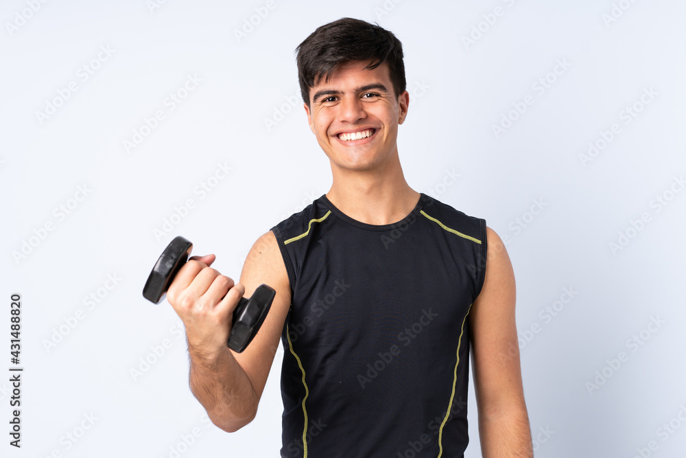 Sport man making weightlifting over isolated blue background with happy expression Sport man making weightlifting over isolated blue background with happy expression