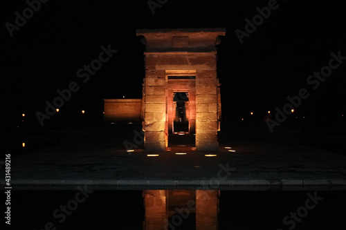 Illuminated Debod Temple at night in Madrid