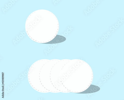 Cosmetic cotton pads isolated on blue background. Top view