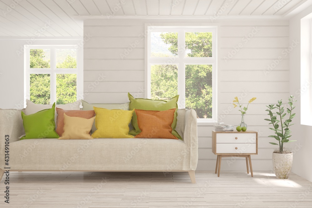 Fototapeta premium White living room with sofa and summer landscape in window. Scandinavian interior design. 3D illustration