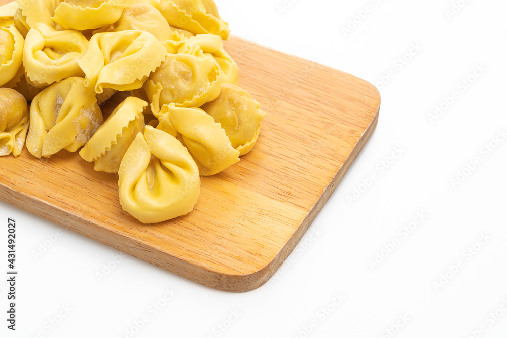 Italian traditional tortellini pasta on white background