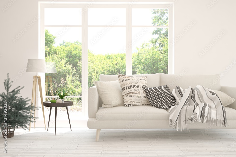 Fototapeta premium White living room with sofa and summer landscape in window. Scandinavian interior design. 3D illustration