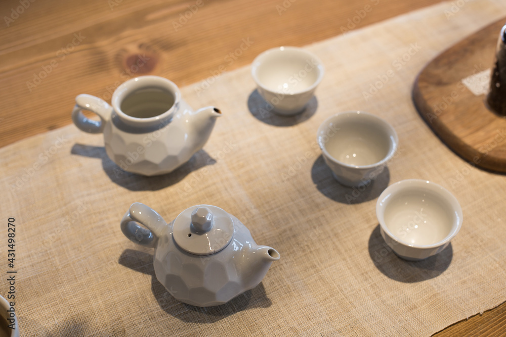 Asian food background with a tea set, cups, and teapot. Asian food background with a tea set, cups, and teapot.