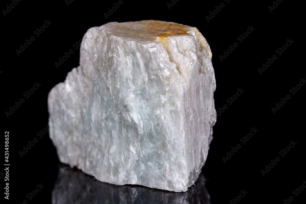Macro mineral stone Talc on black background Macro mineral stone Talc on black background
