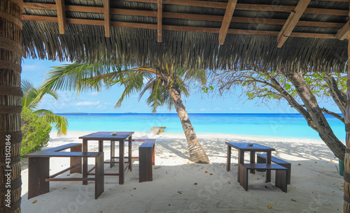 Fototapeta Naklejka Na Ścianę i Meble -  dining tables on a tropical island