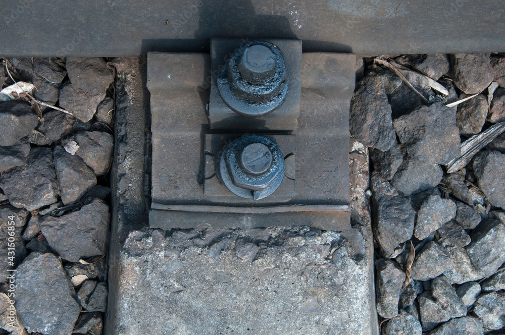 bolted connection close up. attachment point for rails and sleepers bolted connection close up. attachment point for rails and sleepers