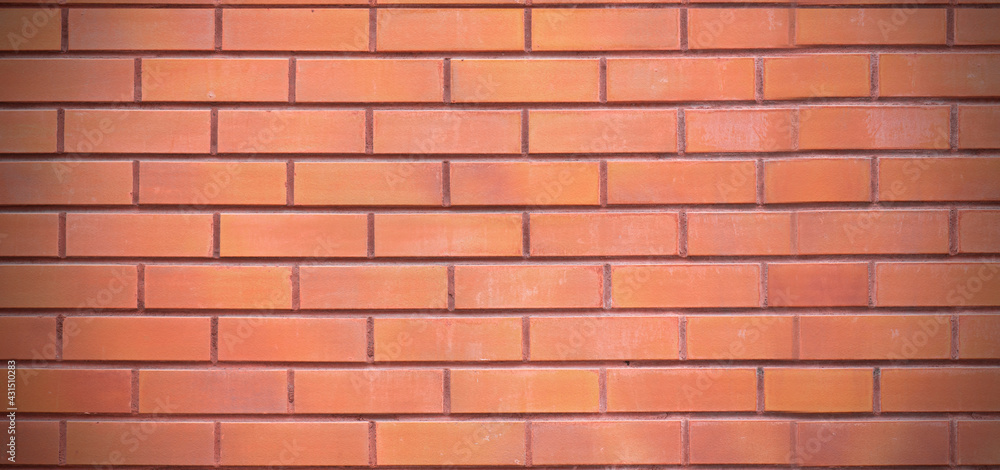 Fototapeta premium Brown brick wall, clean smooth blank surface, long picture as background