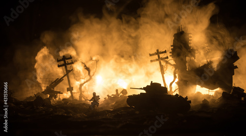 War Concept. Military silhouettes fighting scene on war fog sky background, World War Soldiers Silhouette Below Cloudy Skyline At night. Battle in ruined city. Selective focus