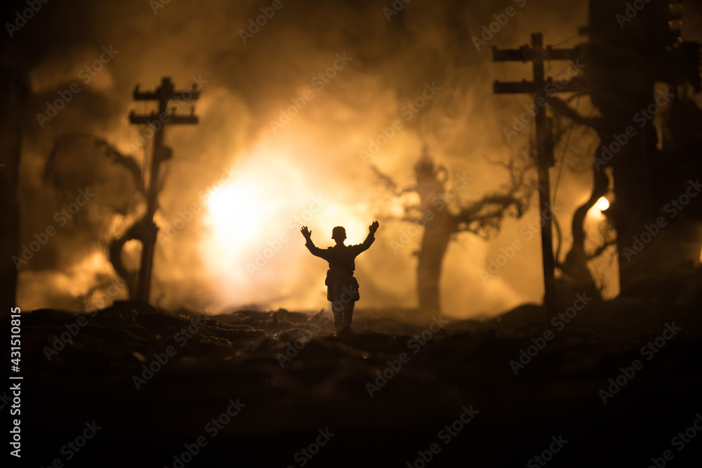Battle scene. Military silhouettes fighting scene on war fog sky background. A German soldiers raised arms to surrender. Plastic toy soldiers with guns taking prisoner the enemy soldier. Artwork